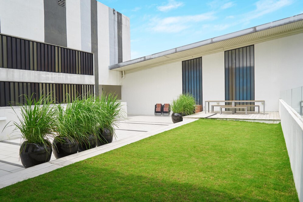 outdoor-patio-with-empty-chair-table-modern-building-malaysia_146508-1910.jpg
